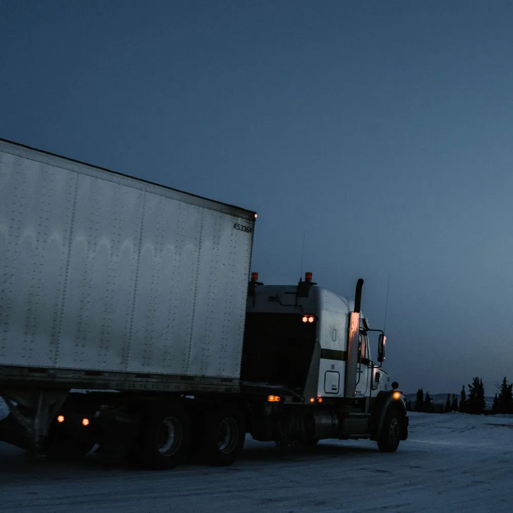 A commercial truck at night.